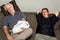 Three Asleep on a Couch Newborn Baby Grandfather and Man with Do