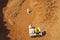 Three astronauts exploring mars with a vehicle, concept