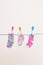 Three Babies Socks On Washing Line