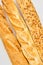 Three baguettes on white background.