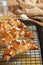 Three baked honey almond crescents, with sliced almonds