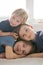 Three beautiful children, boy brothers, having family portrait, hugging