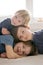 Three beautiful children, boy brothers, having family portrait, hugging