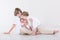 Three beautiful children in white studio