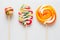 Three beautiful colorful lollipops on sticks