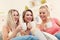 Three beautiful young women chilling at home