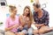 Three beautiful young women chilling at home