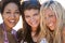 Three Beautiful Young Women Friends Laughing