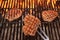 Three Beef Steaks On The Hot BBQ Flaming Grill