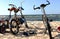 Three bicycles on a sandy beach of Baltic sea