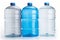 Three big plastic water cooler bottles. White background. Concept of bulk hydration supply, water storage for office or