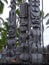 Three big wooden Tiki sculptures in the Pu`uhonua o Honaunau National Park, Big Island, Hawaii
