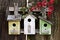 Three Birdhouses on old fence