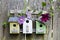 Three birdhouses on old wooden fence