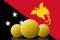 Three Bitcoins cryptocurrency with Papua New Guinea flag on background