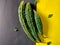 Three Bitter Gourds or Bitter Melons in different sizes