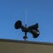Three black modern megaphones loudspeaker on the building roof