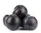 Three black plums, isolated on white background