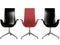 Three black and red office armchairs isolated