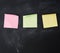 Three blank paper multi-colored square stickers