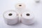Three blank roll paper for cashiers on white