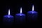 Three blue candles