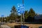 Three blue direction signs with arrows pointing directions to Atlantic City, Philadelphia and Camden.