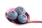 Three blueberries in purple metal spoon.