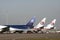 Three boeing cargo planes 777 in a Row.