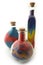 Three bottles with colorful sand