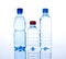 Three Bottles water over a white background