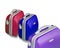 Three bright colored suitcase