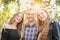 Three Brother and Sisters Portrait Outdoors