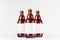 Three brown belgian steinie beer bottles 500ml with blank white label on white wooden board, mock up.