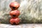 Three brown clay pots arranged one by one in a straight manner