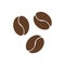 Three brown coffee beans vector icon