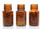 Three Brown Medicine Bottles With Different Drugs