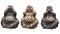 Three Buddha statues in a pose of three wise monkeys