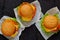 Three burgers with falafel, salad, cheese, tomatoes on the black wooden background. Traditional American or Middle Eastern food