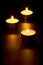 Three burning candles