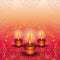 Three burning candles on a golden mandala. Background for holiday festival of lights Diwali