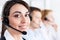 Three call center service operators at work
