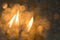 Three candles are burning. Specially defocused photo, blur. Candle for memorial day, religious ritual, zen spiritual meditation,