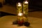 Three candlesticks with floating candles