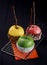 Three candy coated apples for Halloween