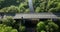 Three cars drive across a picturesque bridge over the Nore River 5k