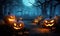 Three carved jack o lantern pumpkins sitting on a table