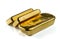 Three cast gold bars, the typical form of bullion gold bullion.