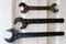 Three cast iron wrenches