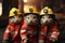 Three cats dressed up as firemen and wearing hard hats.